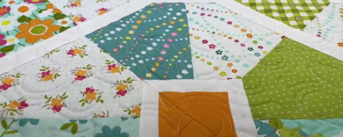 Brenda’s “Large Floral” quilt - Longarm quilted by Maynard Longarm Quilting