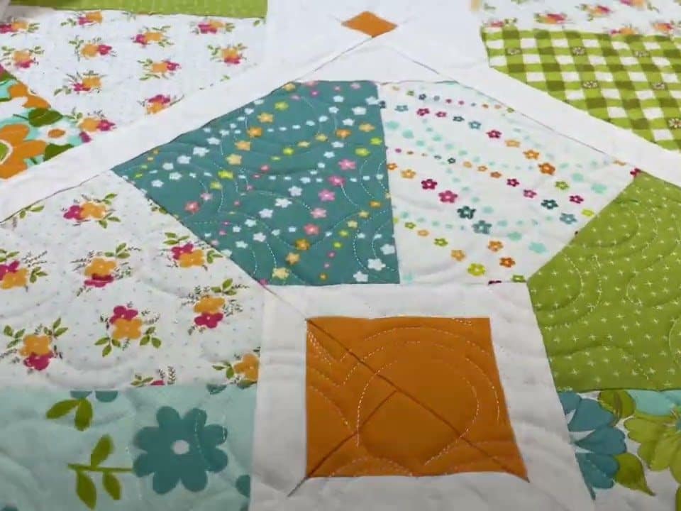 Brenda’s “Large Floral” quilt - Longarm quilted by Maynard Longarm Quilting
