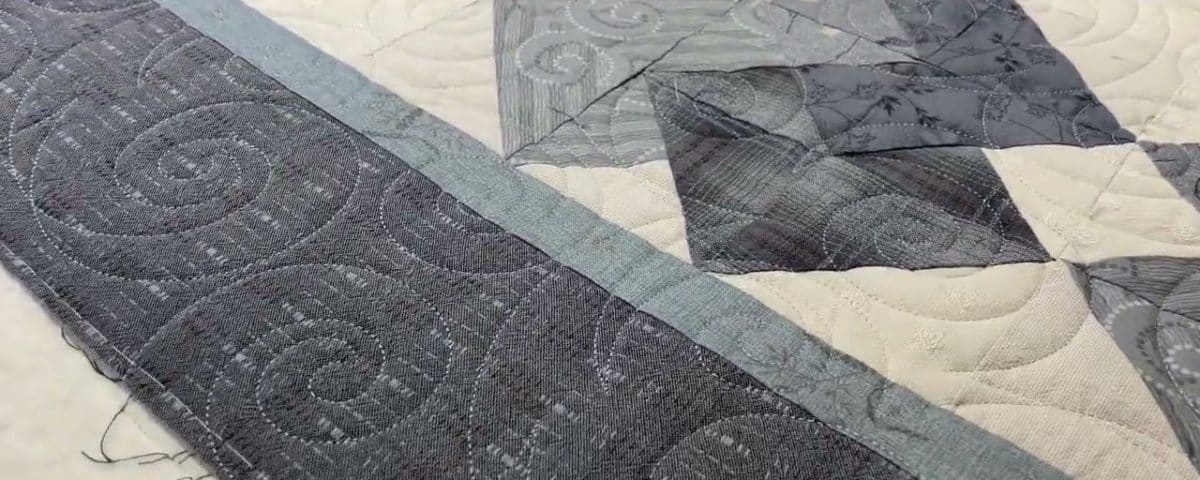 Regina’s “Gray Card Trick” quilt - Longarm quilted by Maynard Longarm Quilting