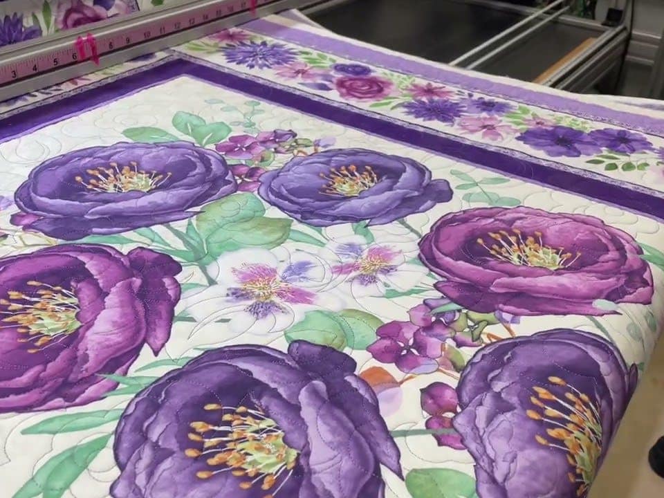 Vicki’s “Peony panel” quilt - Longarm quilted by Maynard Longarm Quilting