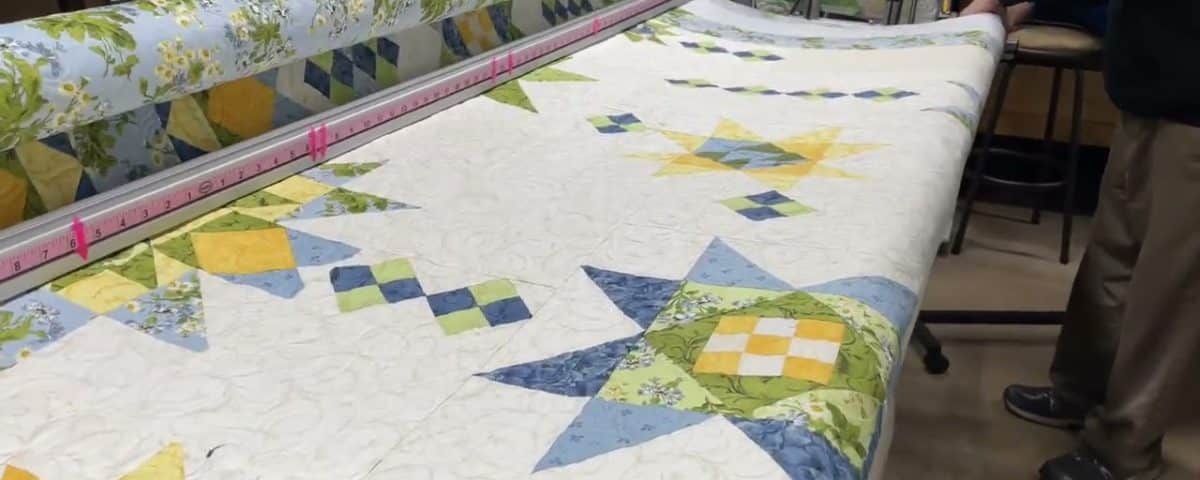 Kate’s “Poppy” quilt - Longarm quilted by Maynard Longarm Quilting