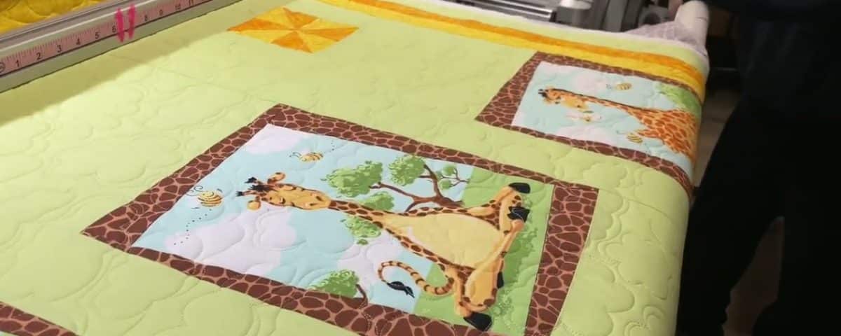 Sandy’s “Baby giraffe” quilt - Longarm quilted by Maynard Longarm Quilting