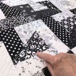 Barb’s “Scrapy B&W’s” quilt - Longarm quilted by Maynard Longarm Quilting