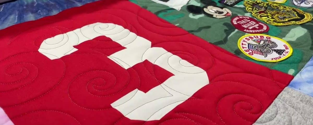 Lois’s “T-Shirt” quilt - Longarm quilted by Maynard Longarm Quilting