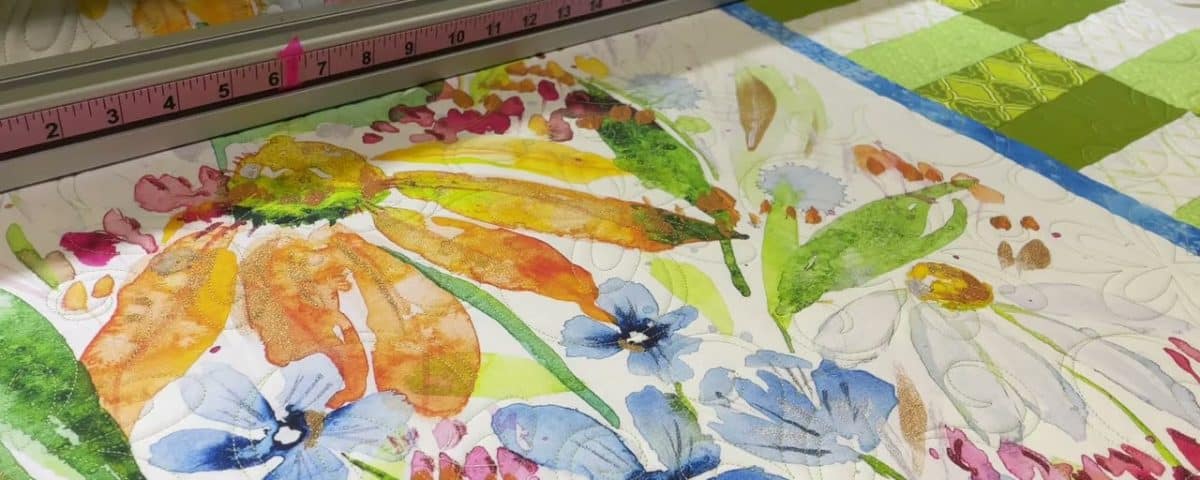 Gloria’s “Flower Panel” quilt - Longarm quilted by Maynard Longarm Quilting