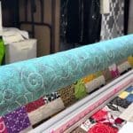 Vicki’s “Scrappy 4-Patch” - Longarm quilted by Maynard Longarm Quilting