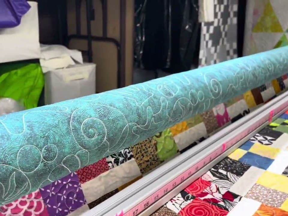 Vicki’s “Scrappy 4-Patch” - Longarm quilted by Maynard Longarm Quilting