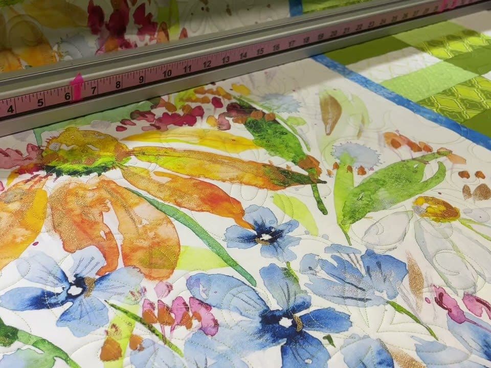 Gloria’s “Flower Panel” quilt - Longarm quilted by Maynard Longarm Quilting