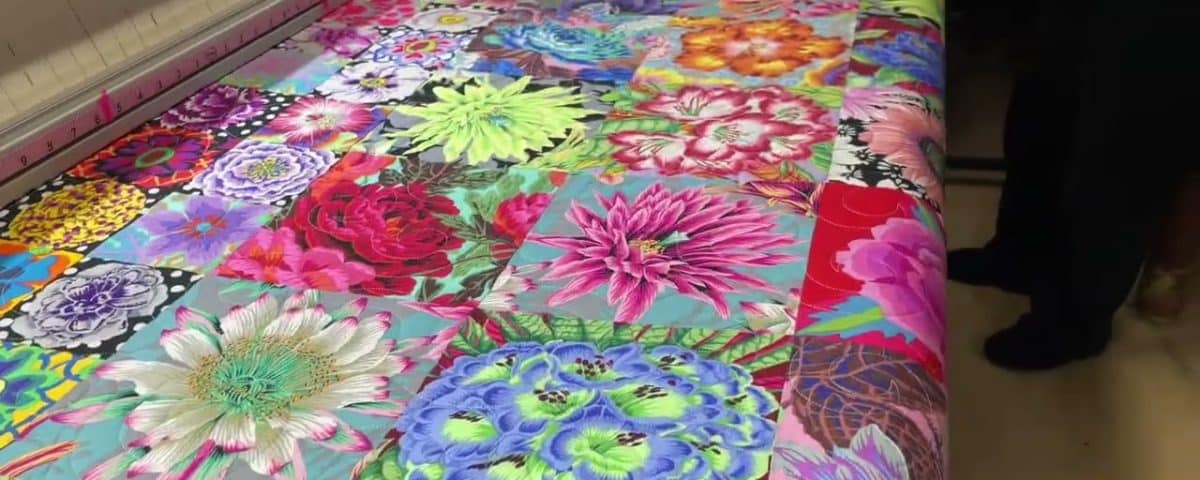 Frances’ “Kaffe Flowers” quilt - Longarm quilted by Maynard Longarm Quilting