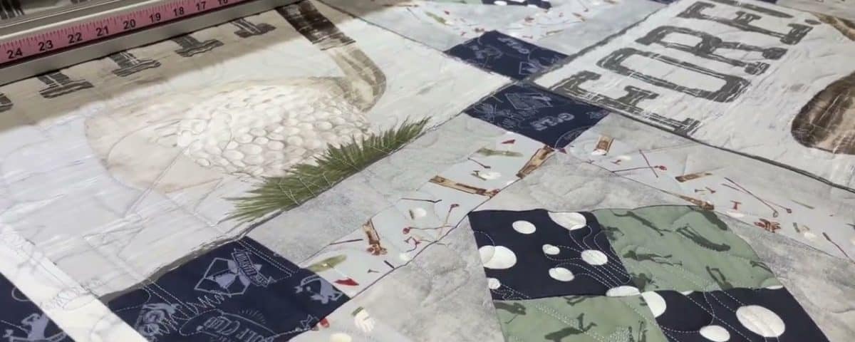 Eileen’s “Golf” quilt - Longarm quilted by Maynard Longarm Quilting