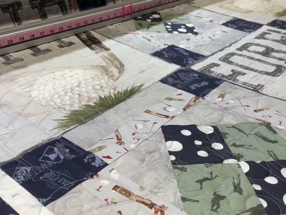 Eileen’s “Golf” quilt - Longarm quilted by Maynard Longarm Quilting