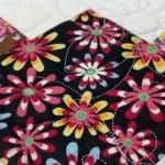 Lori’s “Flower Power” quilt - Longarm quilted by Maynard Longarm Quilting