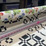 Leslie’s “Coverlet” Wallhanging - Longarm quilted by Maynard Longarm Quilting