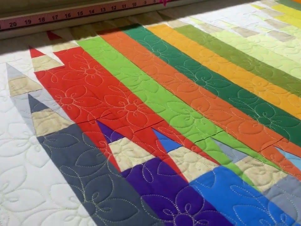 Eileen’s “Color My World” paper pieced quilt - Longarm quilted by Maynard Longarm Quilting