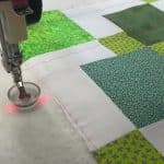 Basting a customer quilt - Longarm quilted by Maynard Longarm Quilting