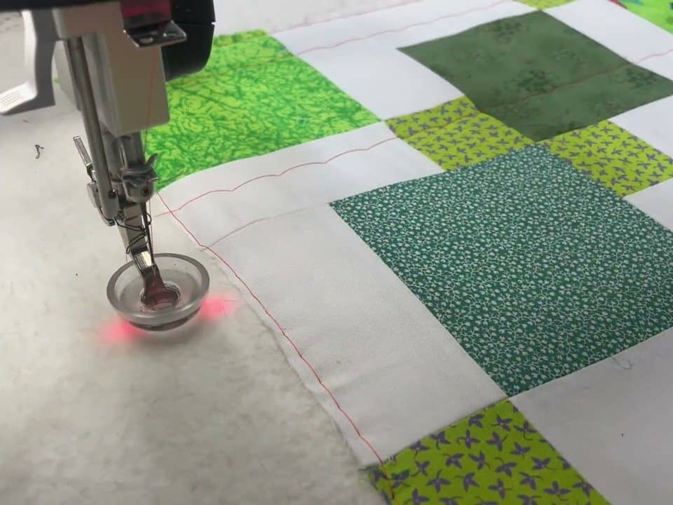 Basting a customer quilt - Longarm quilted by Maynard Longarm Quilting