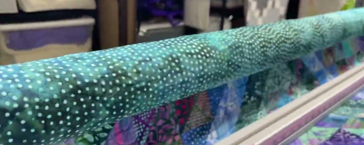 Barb’s “Orbit Around Batiks” quilt - Longarm quilted by Maynard Longarm Quilting