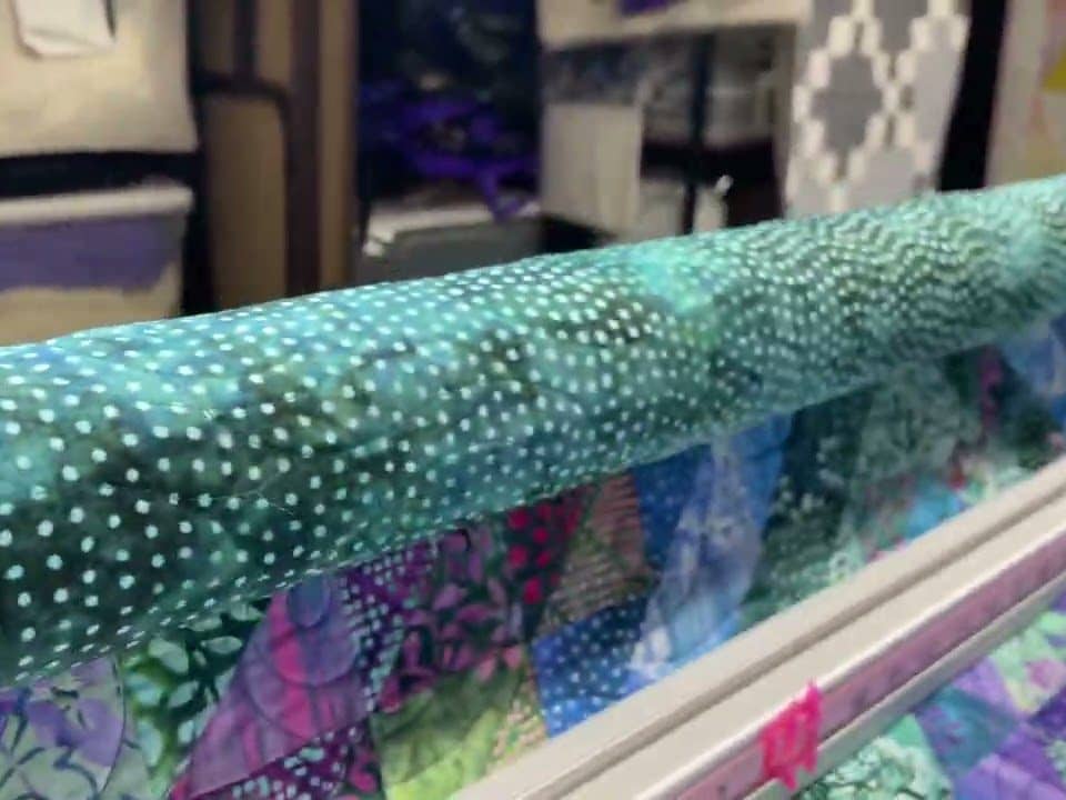 Barb’s “Orbit Around Batiks” quilt - Longarm quilted by Maynard Longarm Quilting