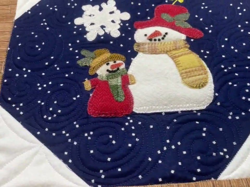Brenda’s “Woolie Snowman” quilt - Longarm quilted by Maynard Longarm Quilting