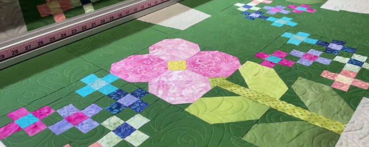 Beth’s “Isabell’s Garden” quilt - Longarm quilted by Maynard Longarm Quilting