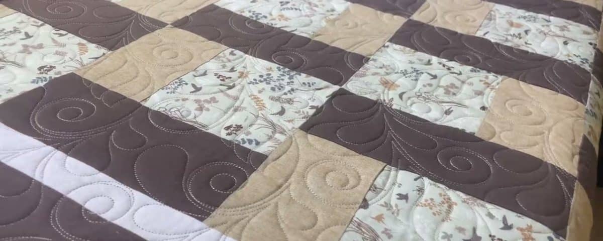 Hope’s “Brown’s & Tan’s” quilt - Longarm quilted by Maynard Longarm Quilting
