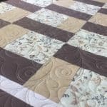 Hope’s “Brown’s & Tan’s” quilt - Longarm quilted by Maynard Longarm Quilting