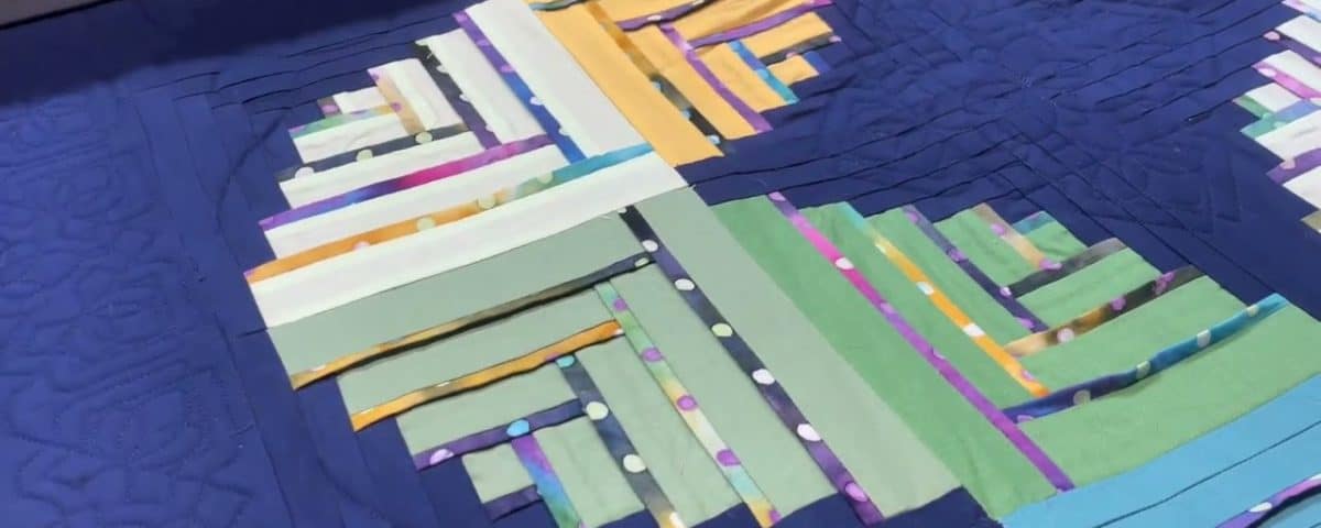 Leslie’s “Puzzazzle” quilt - Longarm quilted by Maynard Longarm Quilting