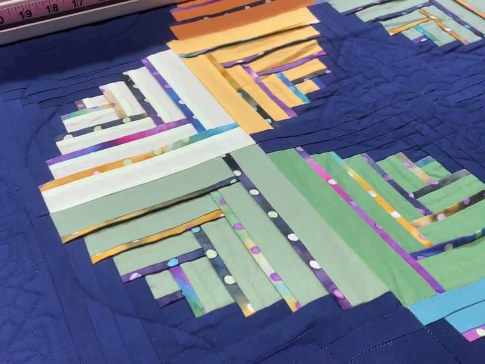 Leslie’s “Puzzazzle” quilt - Longarm quilted by Maynard Longarm Quilting