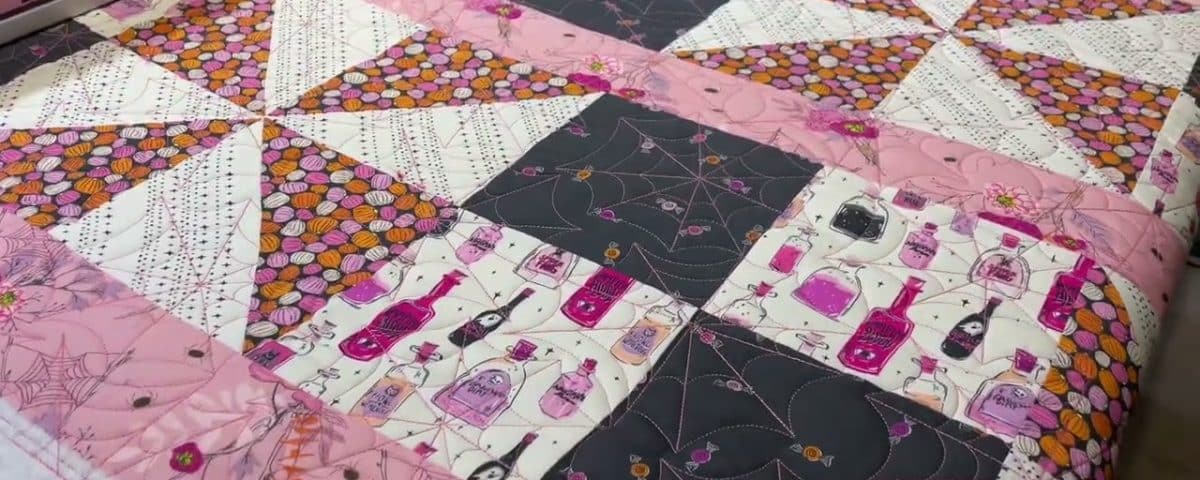Jaimee’s “Sassy Sunflower-Spin Me ‘Round” quilt - Longarm quilted by Maynard Longarm Quilting