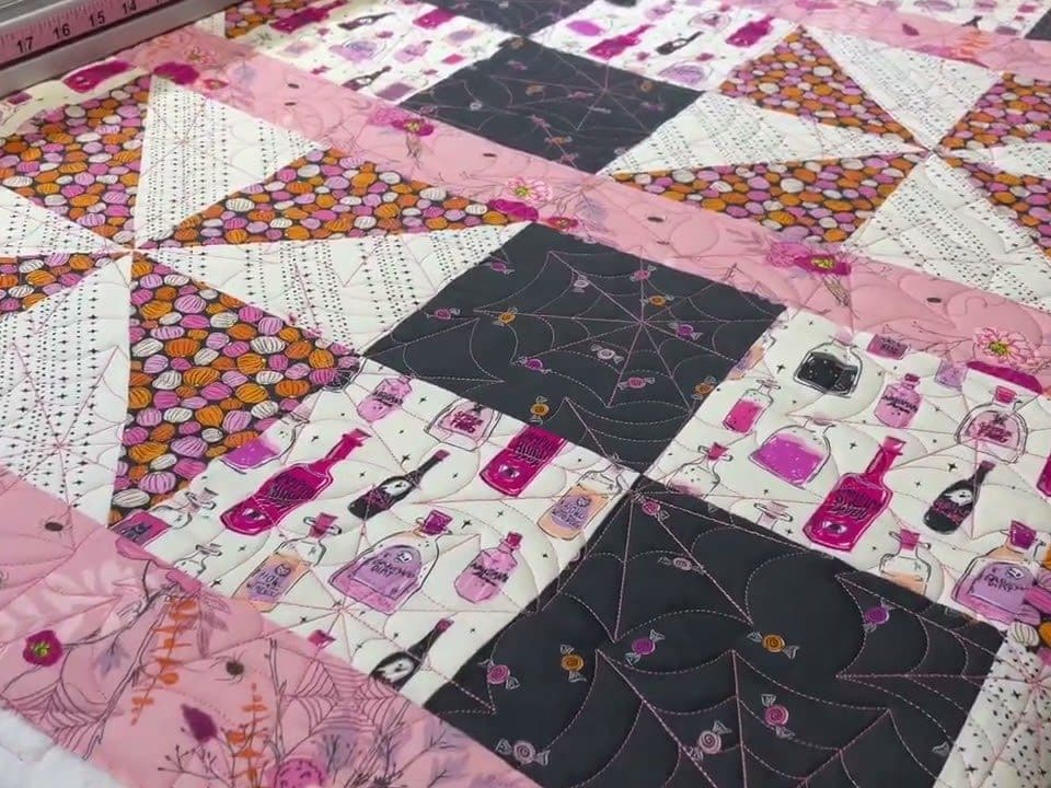 Jaimee’s “Sassy Sunflower-Spin Me ‘Round” quilt - Longarm quilted by Maynard Longarm Quilting