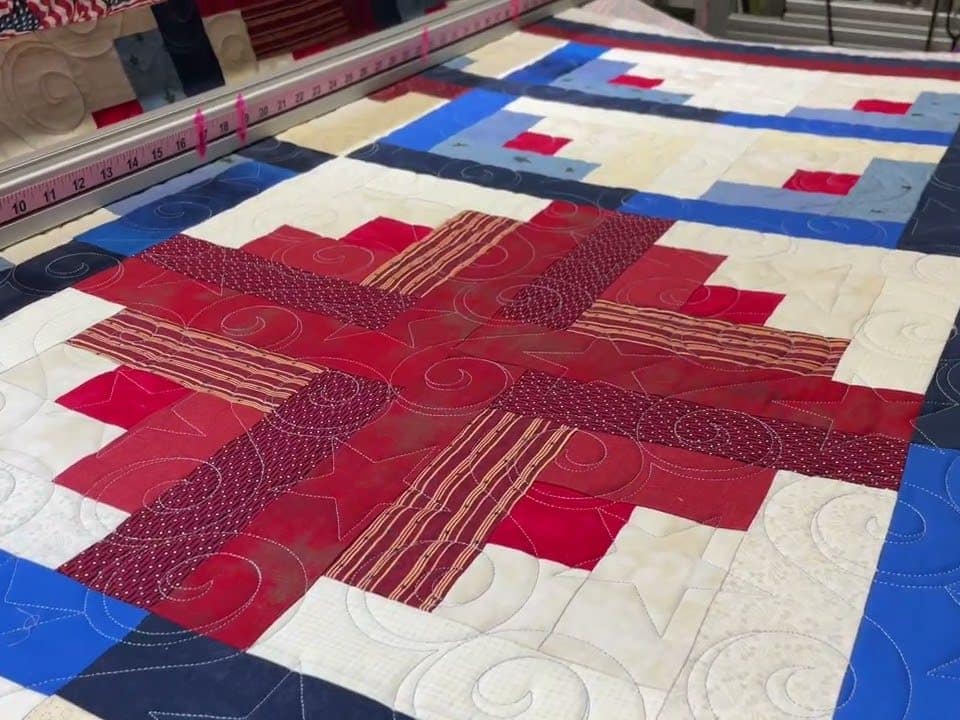Diane’s “Log Cabin QOV” quilt - Longarm quilted by Maynard Longarm Quilting