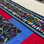 Brenda’s “Electronics Galore” quilt - Longarm quilted by Maynard Longarm Quilting