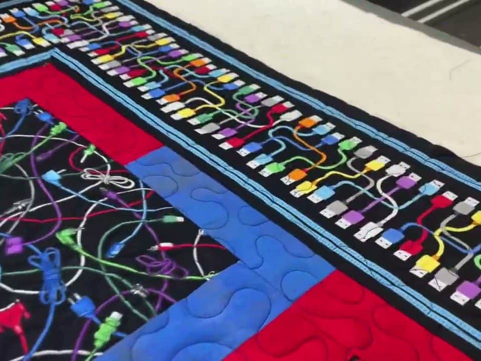 Brenda’s “Electronics Galore” quilt - Longarm quilted by Maynard Longarm Quilting