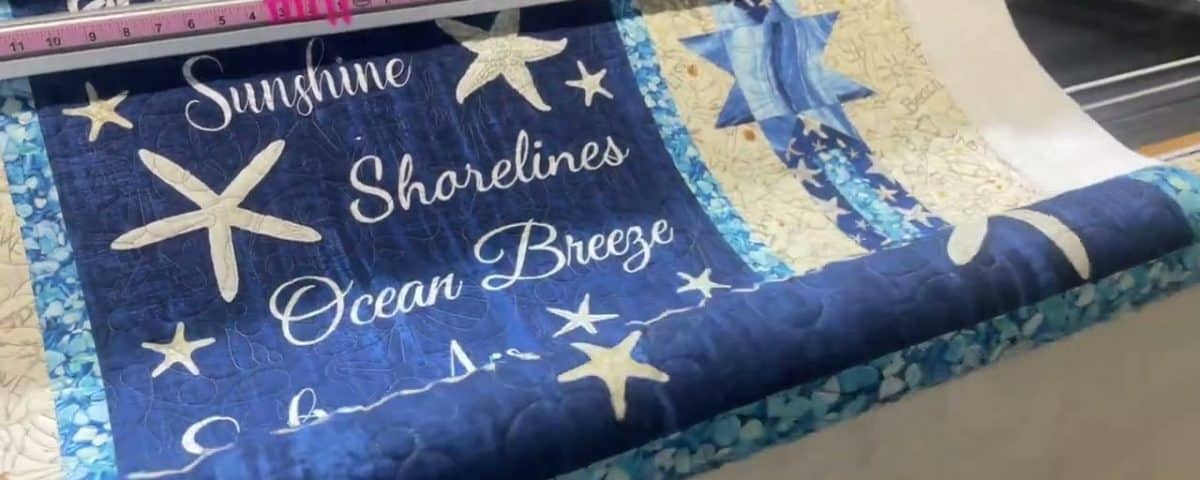 Carol’s “Beach Dreams” panel - Longarm quilted by Maynard Longarm Quilting