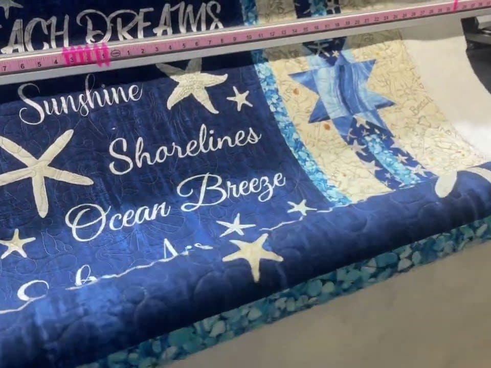 Carol’s “Beach Dreams” panel - Longarm quilted by Maynard Longarm Quilting