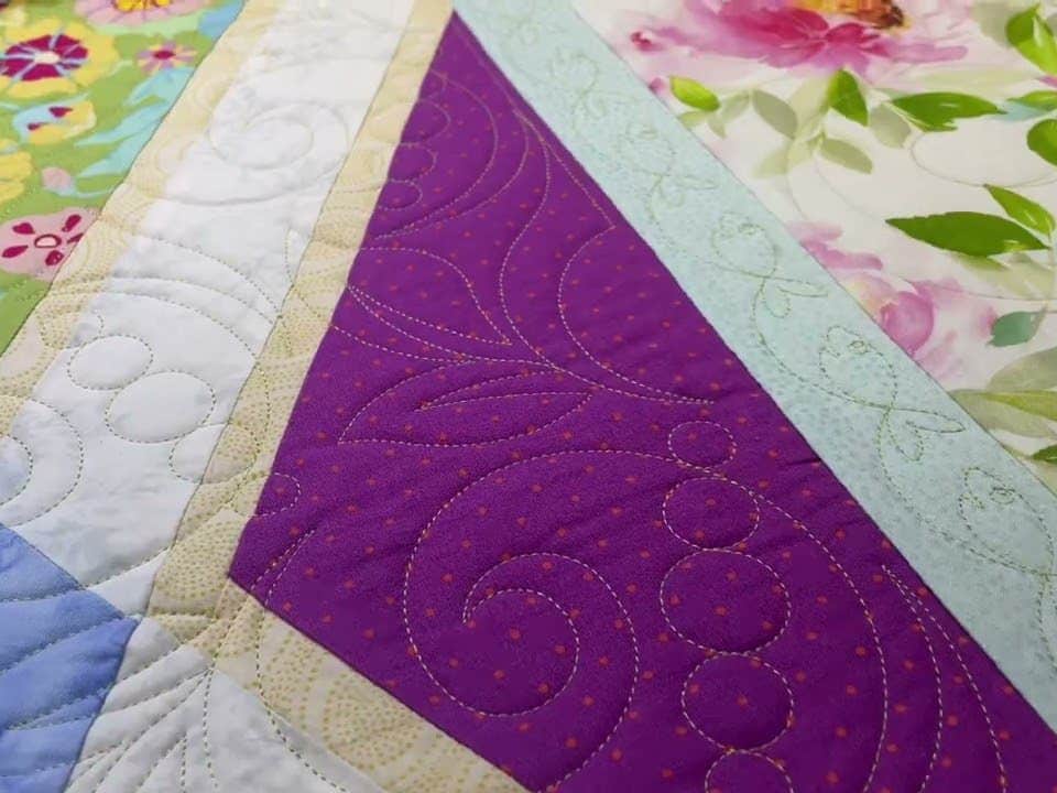 Polly’s “Spring Diamonds” Quilt - Longarm quilted by Maynard Longarm Quilting