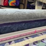 Susan’s “Embroidered Wolf Medallion” quilt - Longarm quilted by Maynard Longarm Quilting