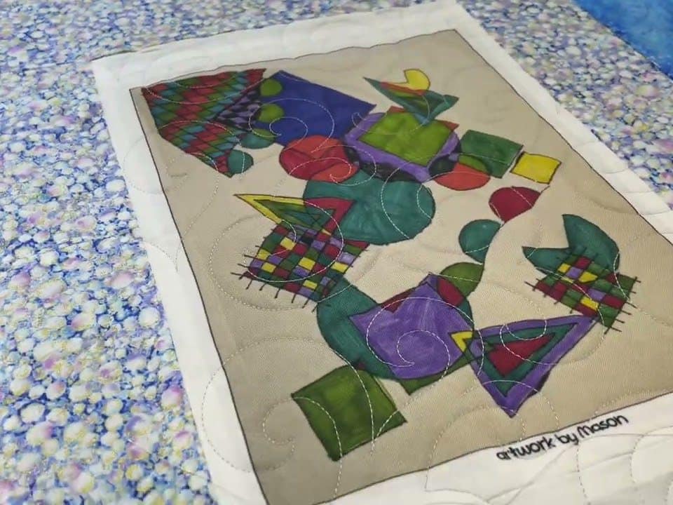 Bette’s “Artwork Panel” quilt - Longarm quilted by Maynard Longarm Quilting