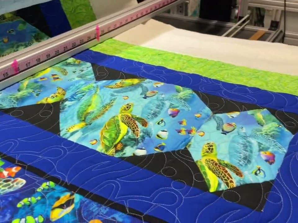 Lori’s “Sea Turtle” quilt - Longarm quilted by Maynard Longarm Quilting