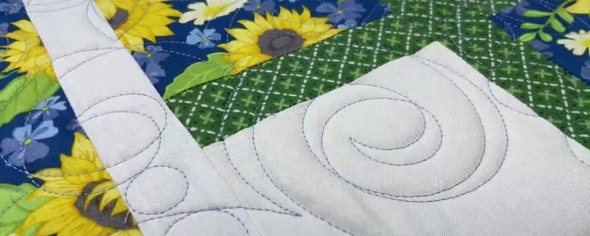 Hope’s “Spring Flowers” quilt - Longarm quilted by Maynard Longarm Quilting