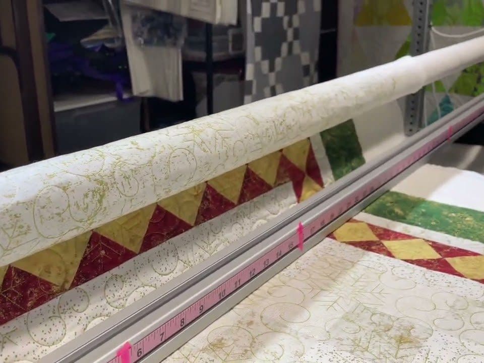 Kathy’s “Little Christmas Blocks” quilt - Longarm quilted by Maynard Longarm Quilting