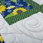 Hope’s “Spring Flowers” quilt - Longarm quilted by Maynard Longarm Quilting
