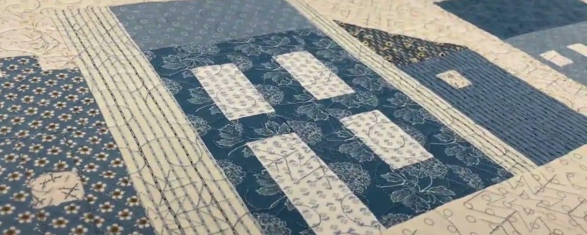 Edie’s “Snowy Houses” quilt - Longarm quilted by Maynard Longarm Quilting