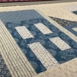Edie’s “Snowy Houses” quilt - Longarm quilted by Maynard Longarm Quilting