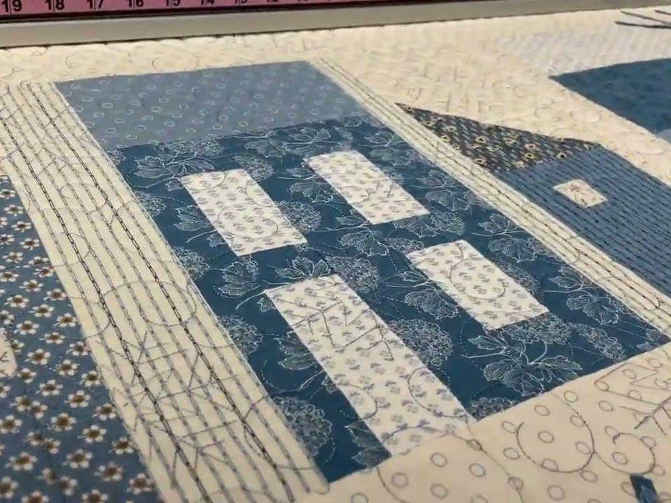Edie’s “Snowy Houses” quilt - Longarm quilted by Maynard Longarm Quilting