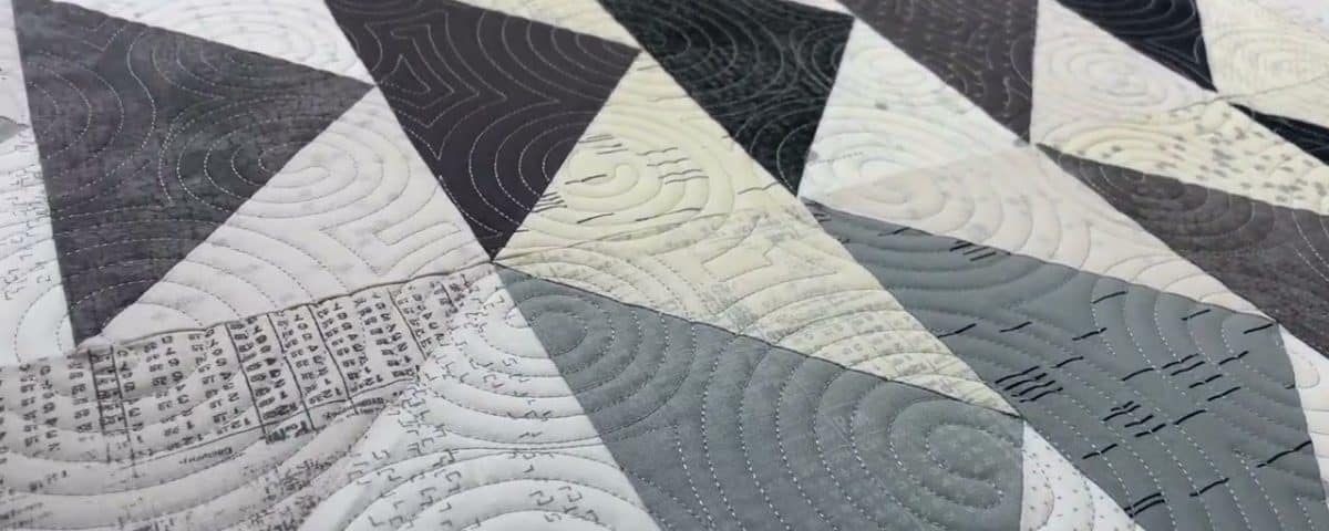 Elaine’s “Twisted Geese” quilt - Longarm quilted by Maynard Longarm Quilting