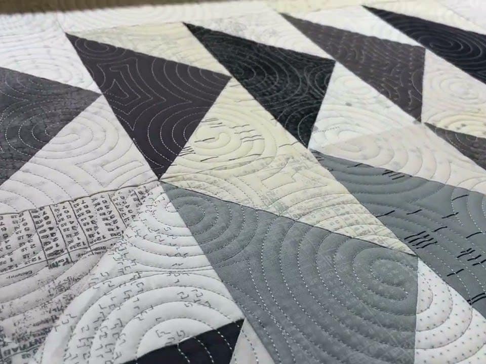 Elaine’s “Twisted Geese” quilt - Longarm quilted by Maynard Longarm Quilting