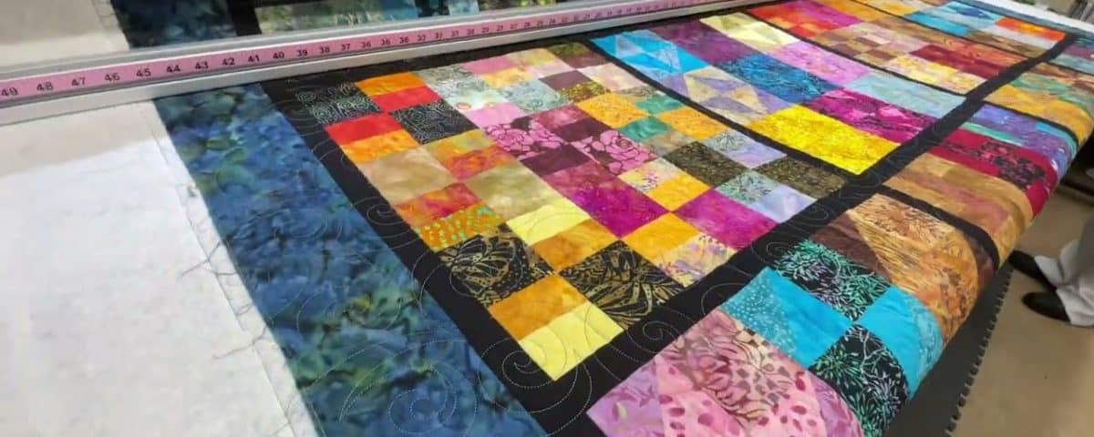 Kay’s “Puzzler” quilt - Longarm quilted by Maynard Longarm Quilting