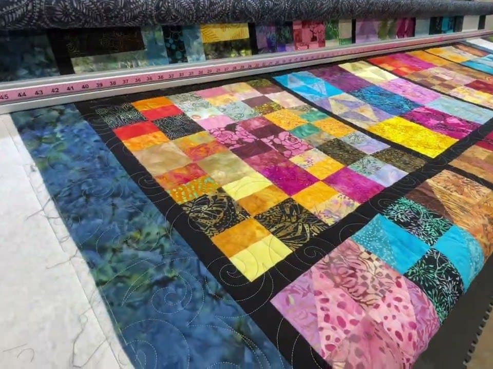 Kay’s “Puzzler” quilt - Longarm quilted by Maynard Longarm Quilting