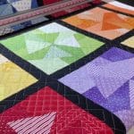 Hope’s “Scrappy Pinwheel” quilt - Longarm quilted by Maynard Longarm Quilting